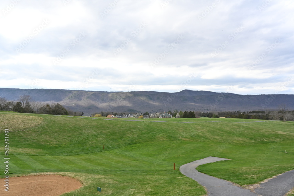 golf course in the mountains in the fall