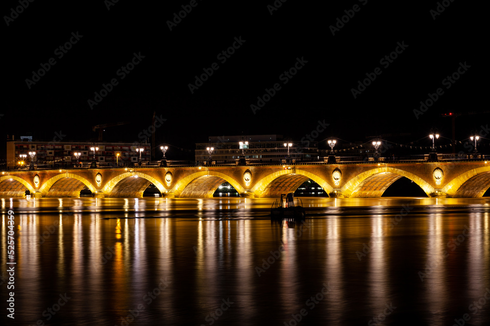 Night view of the famous bridge of Bordeaux called Le Pont de Pierre Night view of the famous bridge of Bordeaux called Le Pont de Pierre