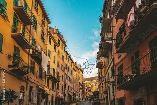 Riomaggiore cinque terre national park italian architecture colorful houses with blue sky and sea