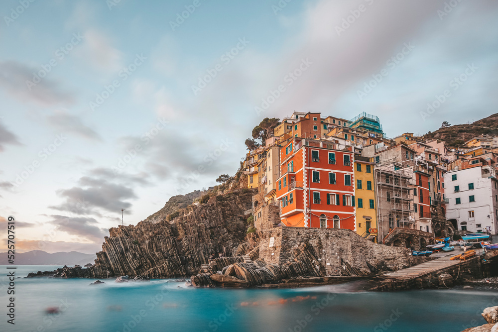 Riomaggiore cinque terre national park italian architecture colorful houses with blue sky and sea