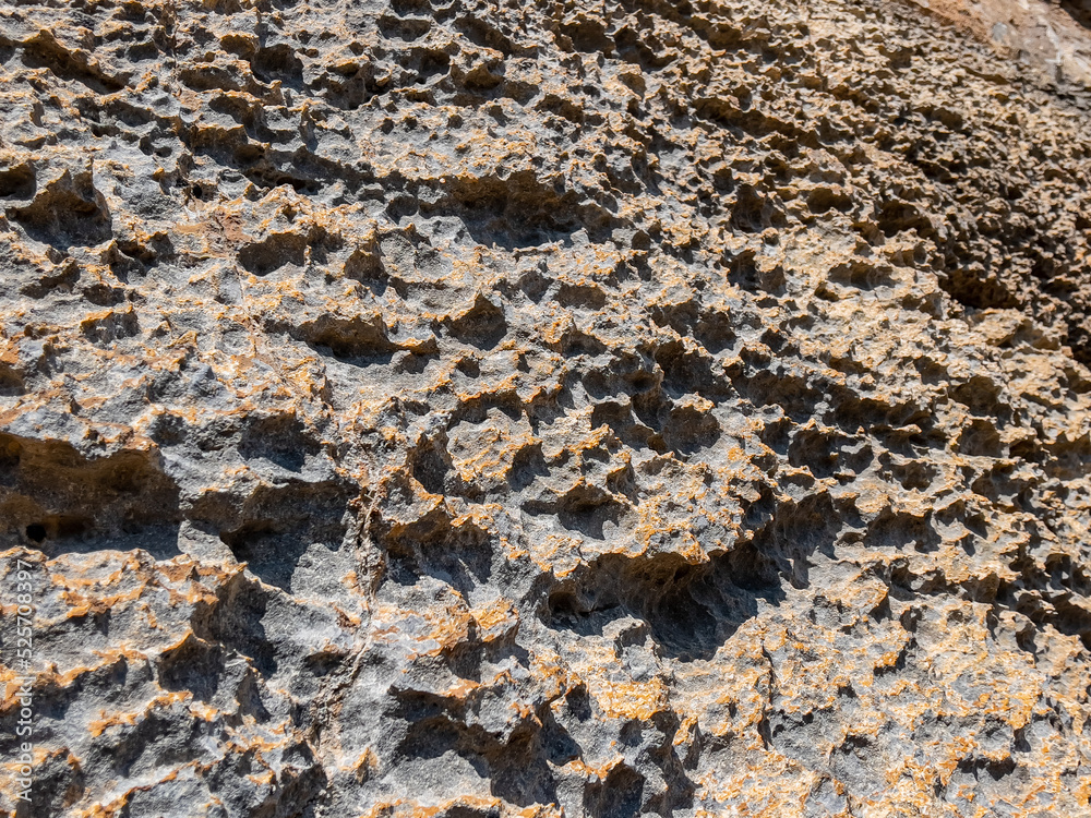 Obraz premium abrasions on limestone cliffs and surface changes and patterns in stones