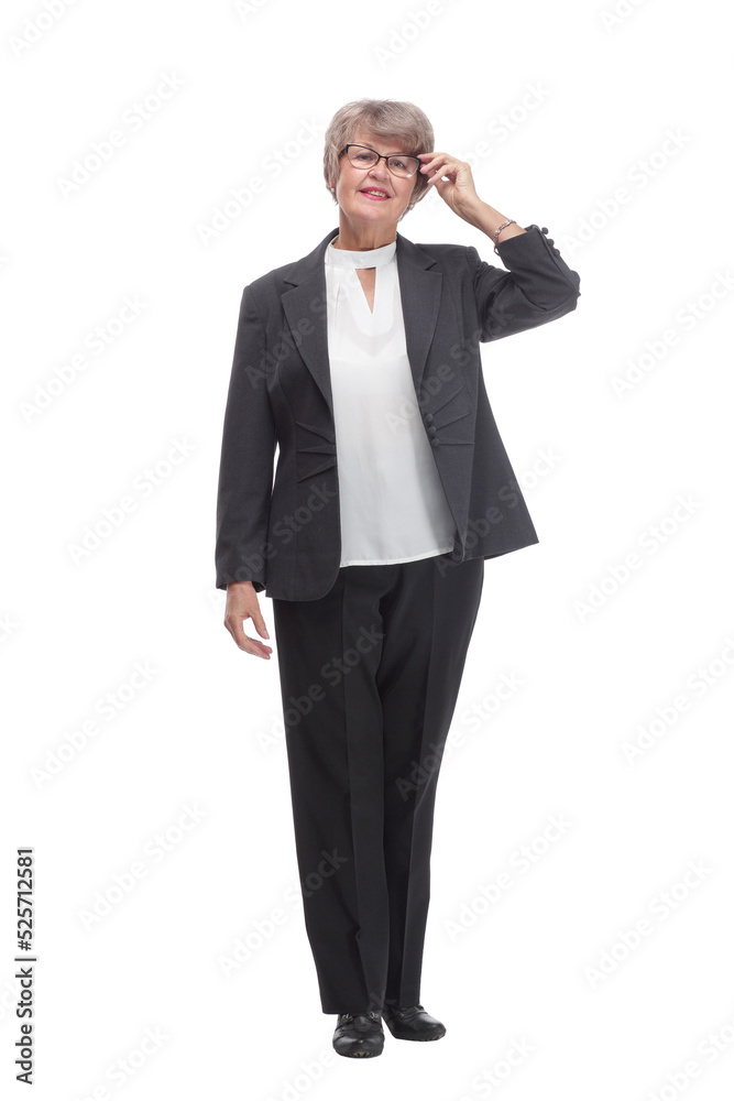 Senior businesswoman wearing black suit posing with crossed arms Senior businesswoman wearing black suit posing with crossed arms