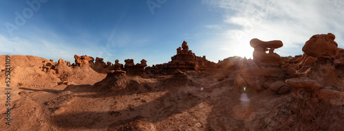 Red Rock Formations in Desert at Sunny and cloudy Sunrise sky. Spring Season. Goblin Valley State Park. Utah, United States. Nature Background Panorama