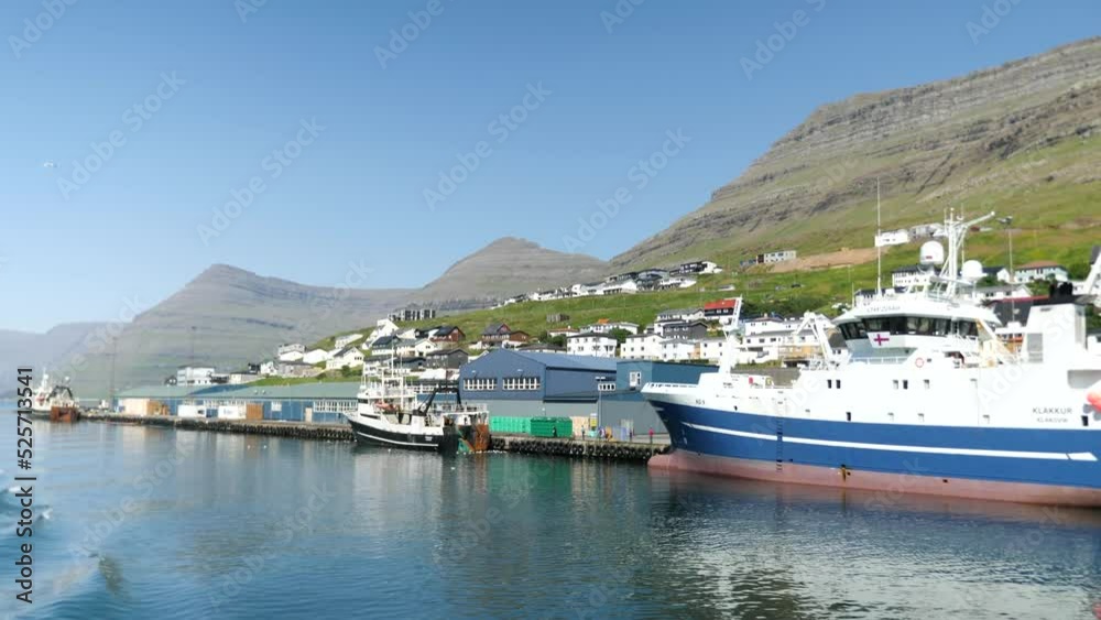 Ferry arriving at the port in Klaksvik. Kunoy Island in the background. High quality 4k footage. Bordoy Island. Klaksvik is second biggest city in Faroe Islands. Harbour full of boats in Faroe. Ferry arriving at the port in Klaksvik. Kunoy Island in the background. High quality 4k footage. Bordoy Island. Klaksvik is second biggest city in Faroe Islands. Harbour full of boats in Faroe.