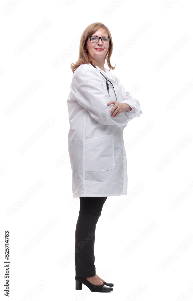 side view. serious female medic looking at a white screen side view. serious female medic looking at a white screen
