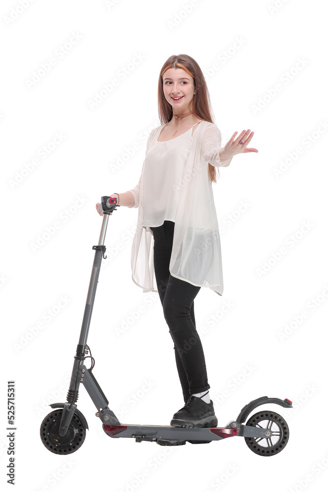 Side view of woman enjoying riding with electric scooter on white background Side view of woman enjoying riding with electric scooter on white background