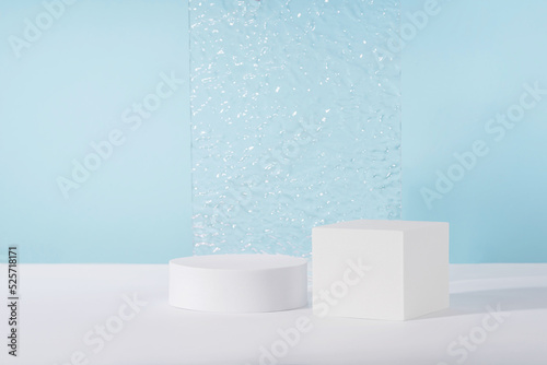 Acrylic ribbed plate  podium  background for cosmetic product packaging on blue backdrop. Showcase for jewellery presentation  display for perfume advertising  cosmetics branding scene mockup