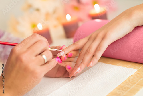 Manicure process in beauty salon  making of artificial nails