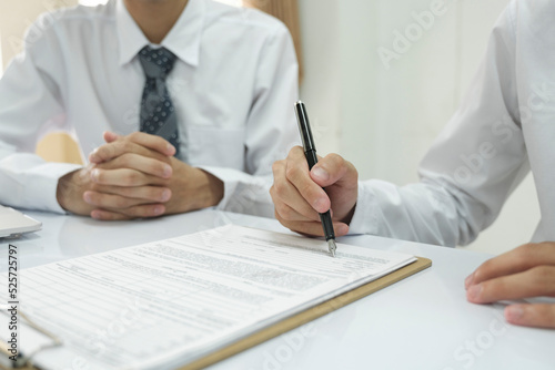 Close up businessman signing contract, partnership agreement, making deal.