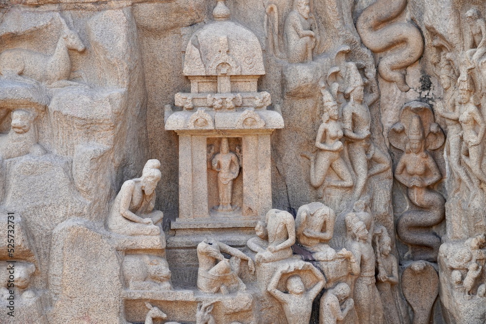 Descent of the Ganges: A giant open-air rock bas relief carved on two monolithic rocks in Mahabalipuram. It contains sculptures of animals, God, people and half-humans carved in the rock relief.