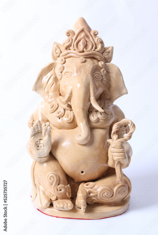 Closeup Hindu God Ganesh over a white background