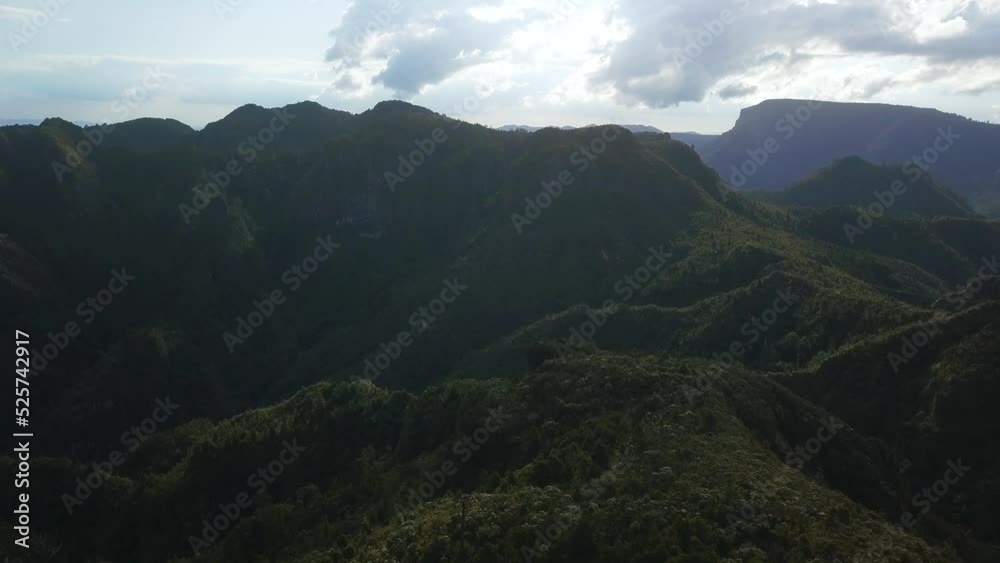 A panoramic view of a mountain range that blocks out the sun. New Zealand. A panoramic view of a mountain range that blocks out the sun. New Zealand.
