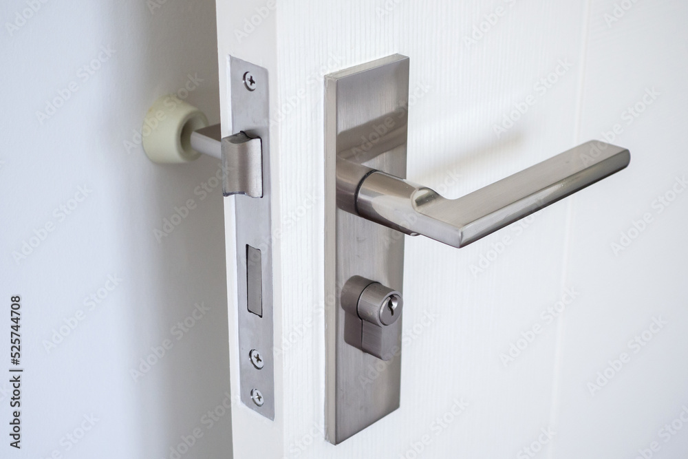Wall mounted door stopper with modern door handle Wall mounted door stopper with modern door handle