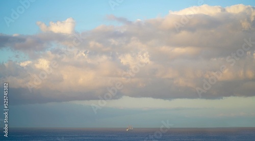 2021, Seaview from Costa Adeje on the ocean with sailingboat.
