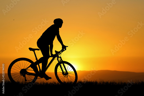 Silhouettes of bikes and cyclists travel concept and exercise by bicycle
