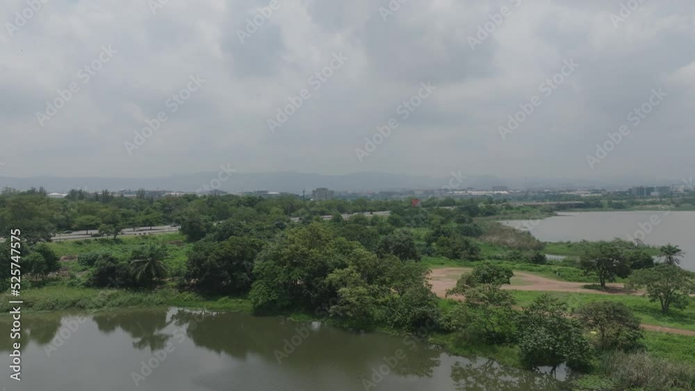 AERIAL - Jabi Lake Reservoir in Abuja, Nigeria, Africa, forward AERIAL - Jabi Lake Reservoir in Abuja, Nigeria, Africa, forward