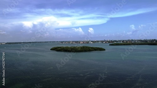 4k aerial drone shot of Boca Ciega Bay.  located on the east of the beaches running along Pinellas County. It has many burier islands comprised Mangroves. photo