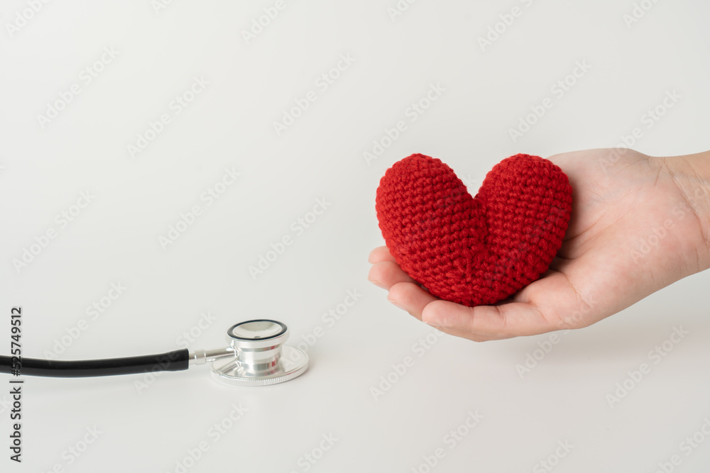 Stethoscope and red heart on white background concept of health care and medical