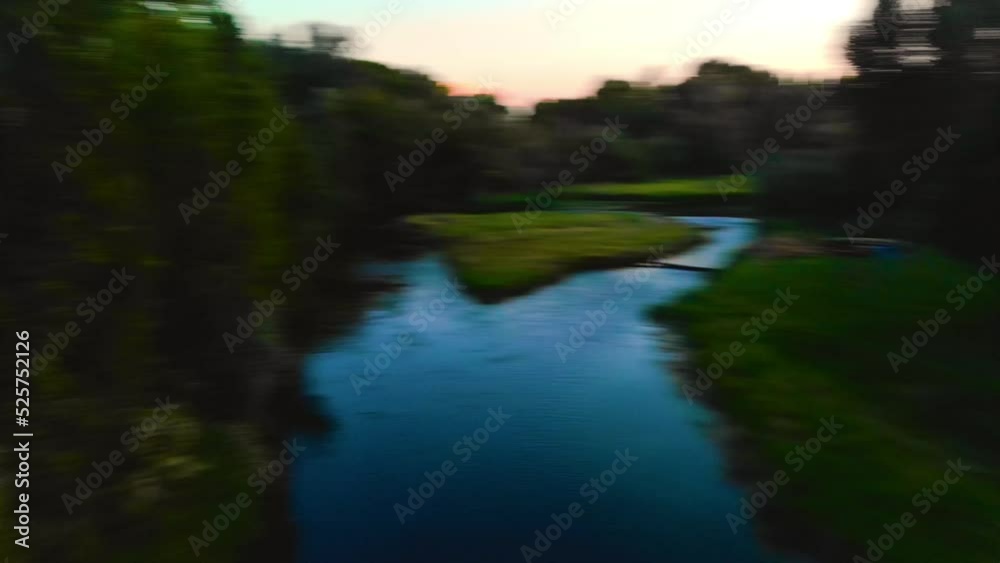 Top angle aerial view Drone shot of homes and farms in Ririe, Idaho with green trees and woods in a beautiful colorful orange sunset 4K UHD 3840
Top angle aerial view Drone shot of homes and farms in Ririe, Idaho with green trees and woods in a beautiful colorful orange sunset 4K UHD 3840