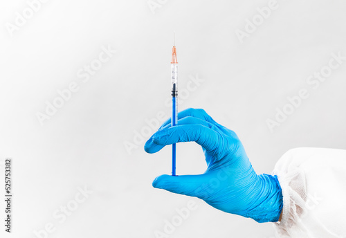 hand holding syringe