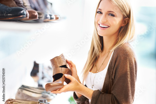 Shoes store shopping happy girl customer smile and buy from luxury boutique shop discount deal or fashion retail sale offer. Happy portrait of young person or woman excited with buy choice at mall