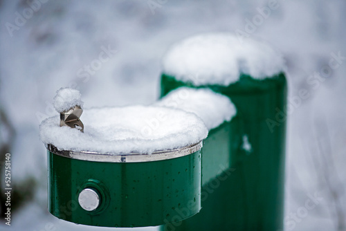 Snow-covered drinking fountain in Lithia Park, Ashland, Oregon photo