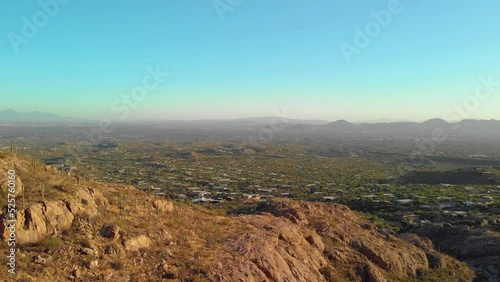 Top angle aerial view desert New Mexico Drone shot of western sand dunes and mountains with blue clear cloudless sky and brush steppe 4K UHD 3840