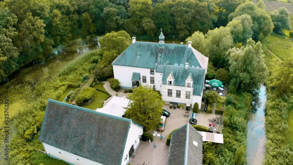 overview from a romantic property on a small island surrounded by trees and a city in the distance overview from a romantic property on a small island surrounded by trees and a city in the distance