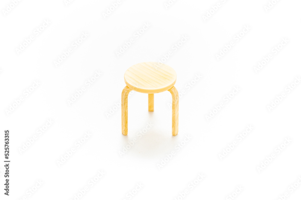 Scandinavian stool chair isolated on white background. Mid century modern furniture. Furniture design. Product design. Miniature chair. Minimalist style. Iconic chair. Modern design. Nordic.