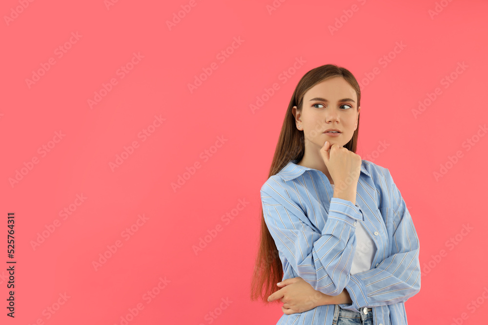 Concept of people, young woman on pink background Concept of people, young woman on pink background