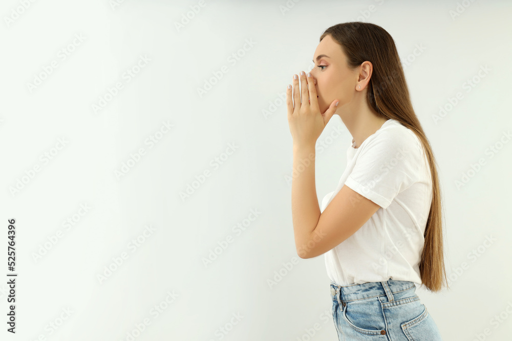 Concept of people, young woman on light background Concept of people, young woman on light background