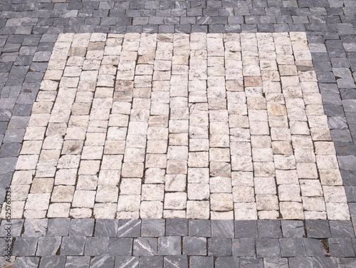 Granite paving stones on the square.