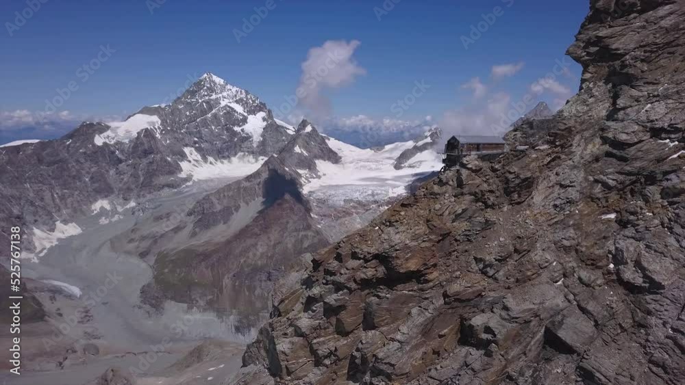 Carrel Hut, Cervino mountain is a refuge for people climbing The Matterhorn. Lions Ridge on Mont Cervin. Safety rest shelter for hikers scaling to the peak. Aerial view from drone. Carrel Hut, Cervino mountain is a refuge for people climbing The Matterhorn. Lions Ridge on Mont Cervin. Safety rest shelter for hikers scaling to the peak. Aerial view from drone.