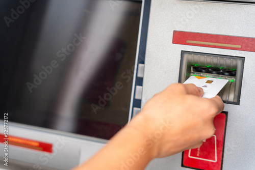 Atm machine money. Hand holding money bank credit card. Withdraw money cash from atm. Us dollar bill, bank credit card.