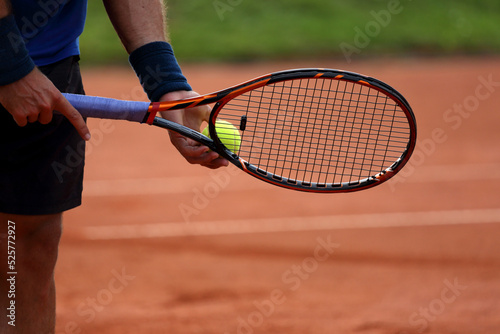 tennis player with racket © AlexZlat