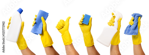 Obraz na plátně hand with yellow rubber glove holding cleaning supplies on transparent backgroun