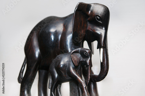 Bilde på lerret Elephants mother and child . Wild animals ebony figurine