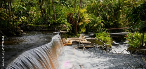Tabacon geothermal waterfall in La Fortuna Arenal volcano area, Costa Rica photo