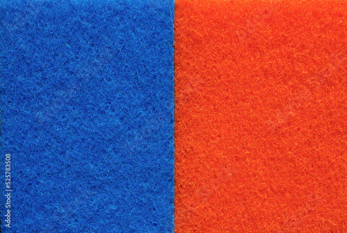 Backdrop texture of kitchen sponge for cleaning. Rough fiber side