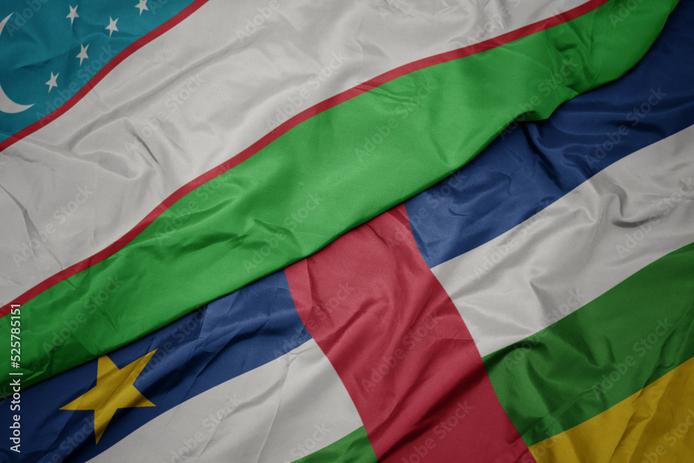 waving colorful flag of central african republic and national flag of uzbekistan.