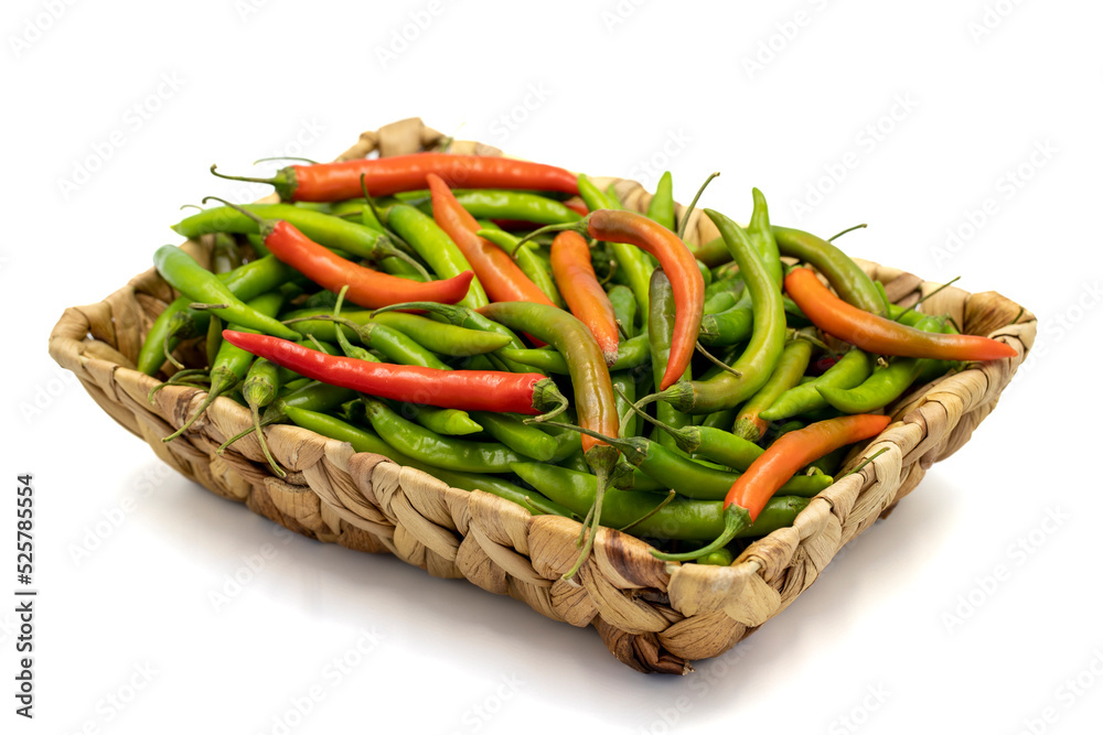 Hot peppers. Spice pepper in basket isolated on white background. Vegetable, healthy vegan food. close up Hot peppers. Spice pepper in basket isolated on white background. Vegetable, healthy vegan food. close up