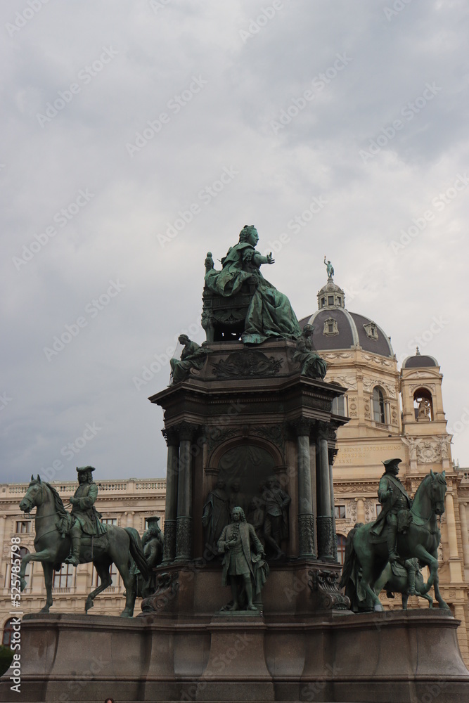 a young European-looking girl poses on Maria Theresa Square in Vienna