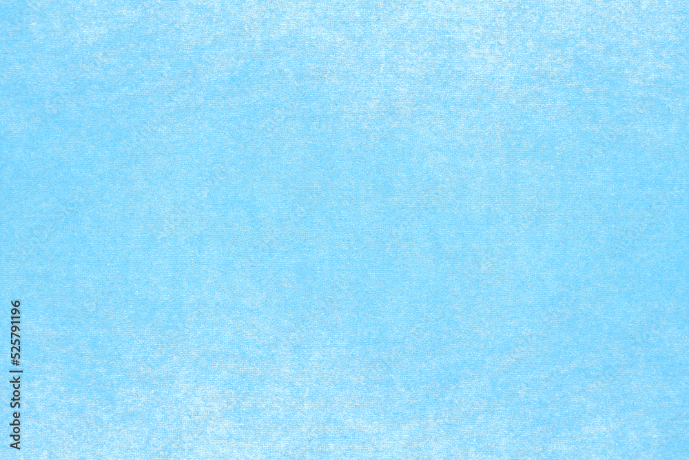 Blue paper background with texture and jagged marks