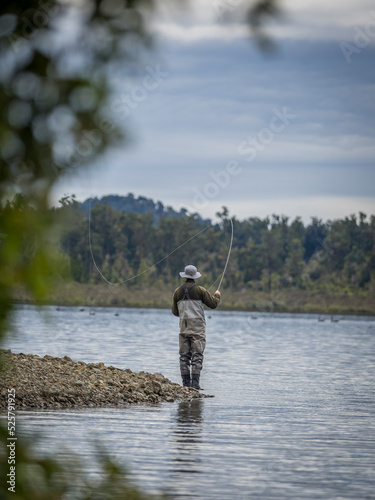 Man fly fishing.