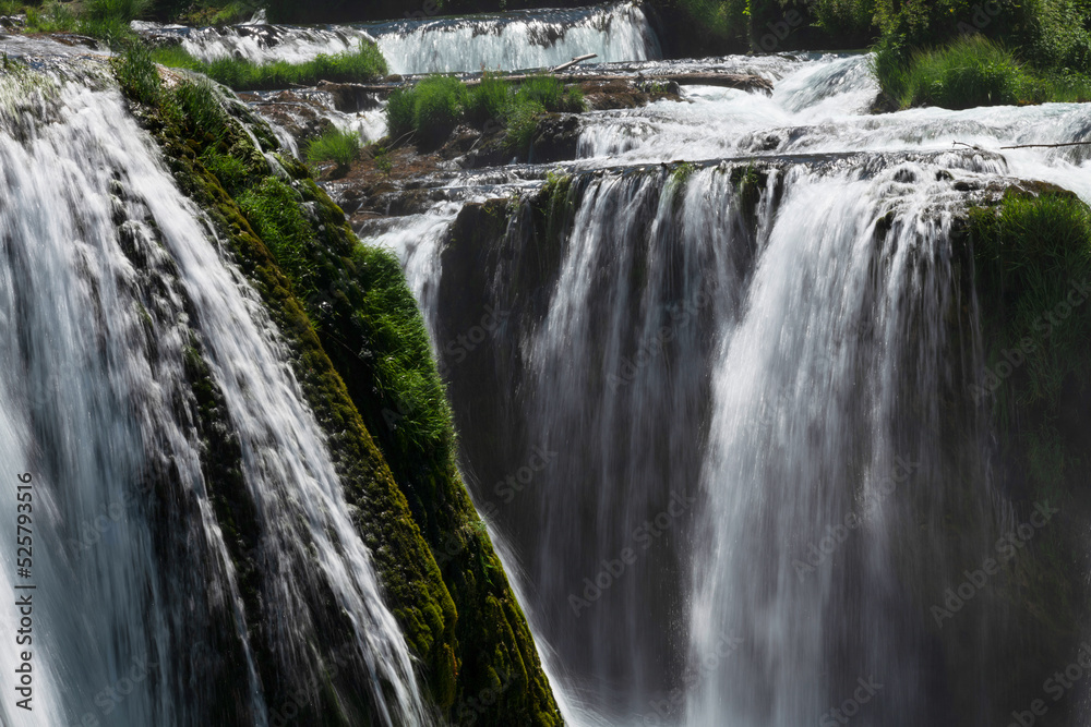Fototapeta premium a magnificent waterfall called strbacki buk on the beautifully clean and drinking Una river in Bosnia and Herzegovina in the middle of a forest.
