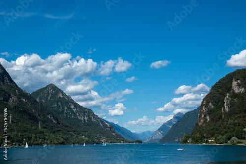 idro lake alpine water basin at the foot of the alpine peaks photo