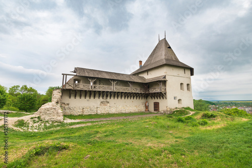Castle of Halych below an overcast sky at summer day in Ukraine photo