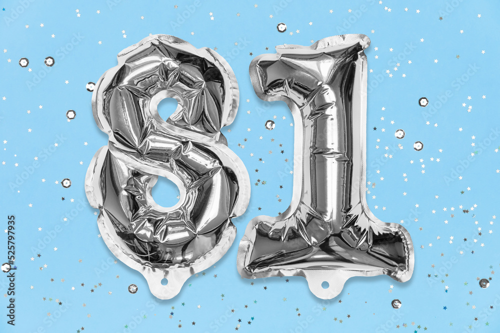 Eighty One Number Silver foil balloon number, digit eighty one on a blue background with ...