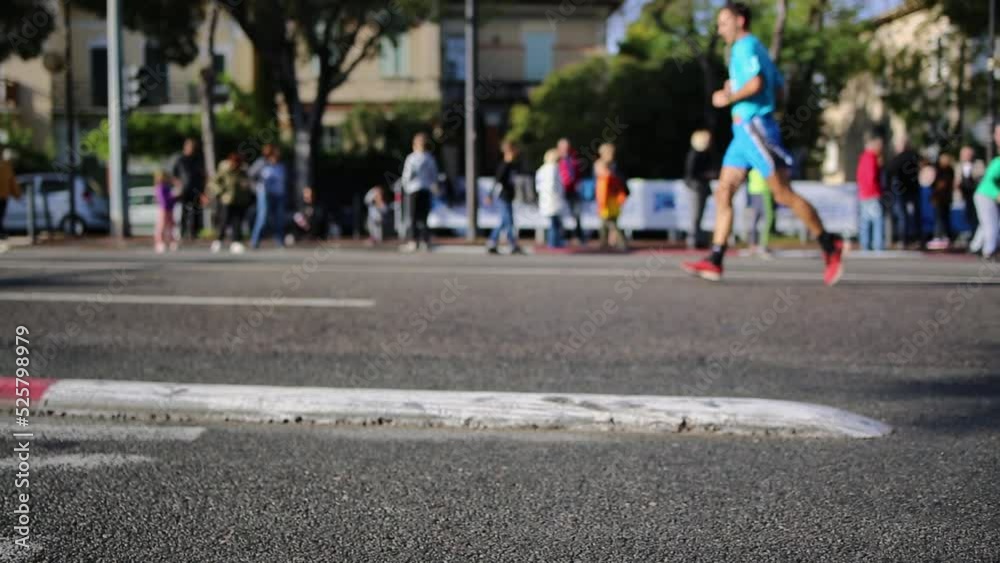 Half marathon in the city - Marseille Cassis in France volontary blurred Half marathon in the city - Marseille Cassis in France volontary blurred