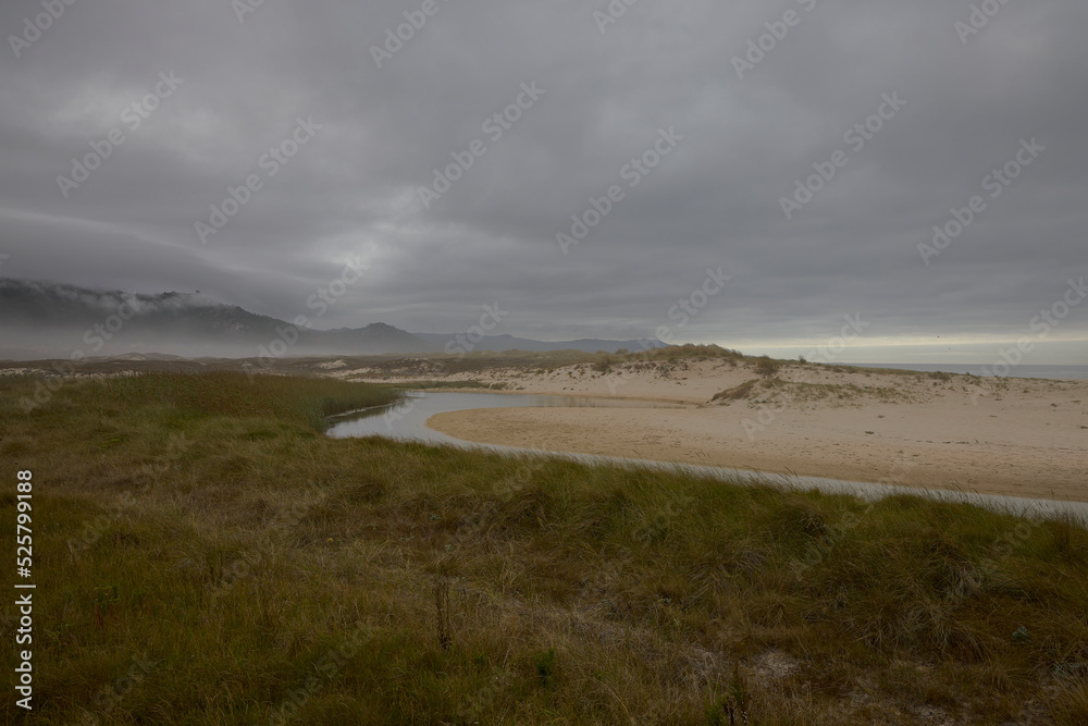 Laxe (Spain), August 20, 2022. Traba Beach. It is a protected area for the many migratory birds and for its dunes Laxe (Spain), August 20, 2022. Traba Beach. It is a protected area for the many migratory birds and for its dunes